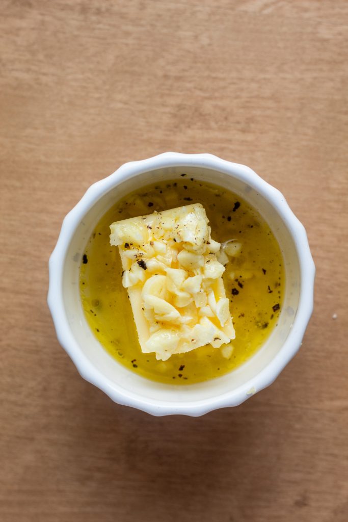 garlic lemon butter in white bowl